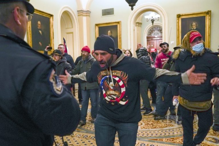 QAnon Jan. 6 rioter who led pursuit of officer sentenced to 5 years