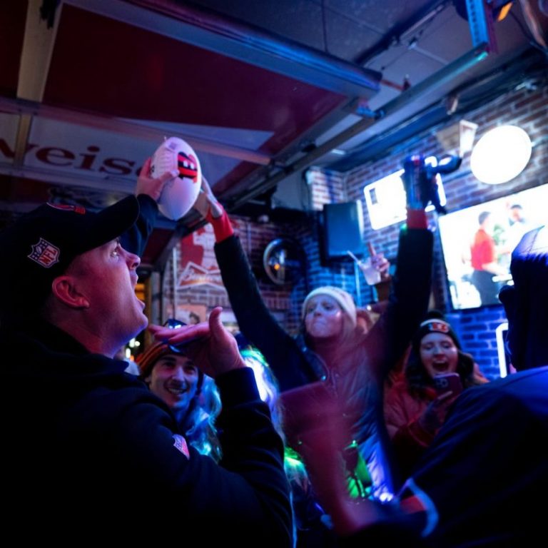 WATCH: Zac Taylor gifts Bengals game ball to Cincinnati bar