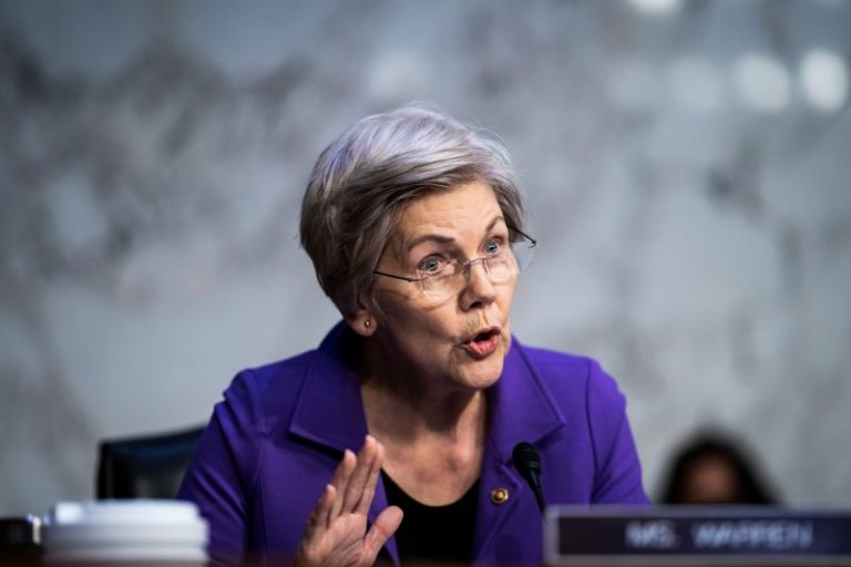 Sen. Warren calls for lifting deposit insurance cap, blasts Fed