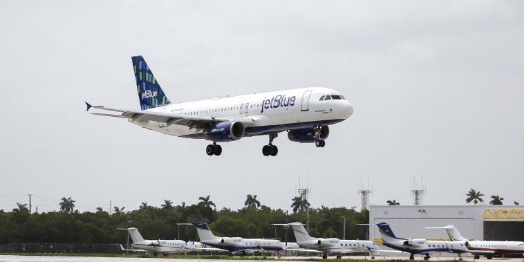 JetBlue says it will end passenger-sharing agreement with American Airlines to focus on buying Spirit