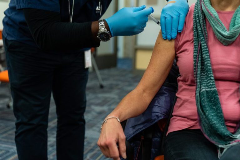 There’s a racial gap on covid vaccine — because of the partisan gap