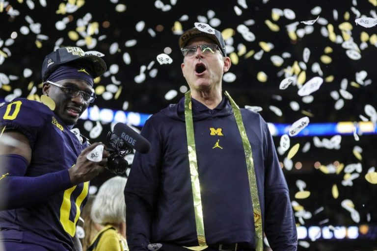 Jim Harbaugh keeps promise, gets Michigan tattoo for national title
