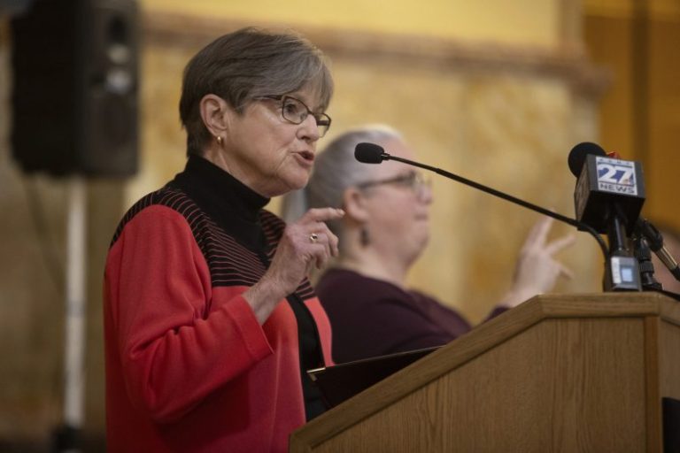 Kansas governor vetoes a ban on gender-affirming care; GOP vows override