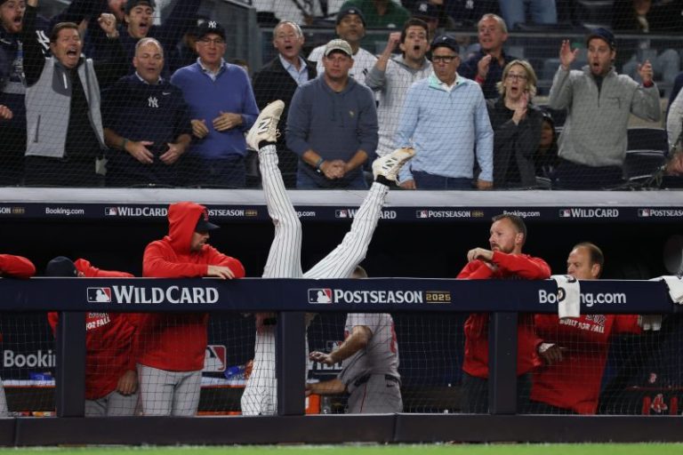 Yankees player flips over dugout railing to record out